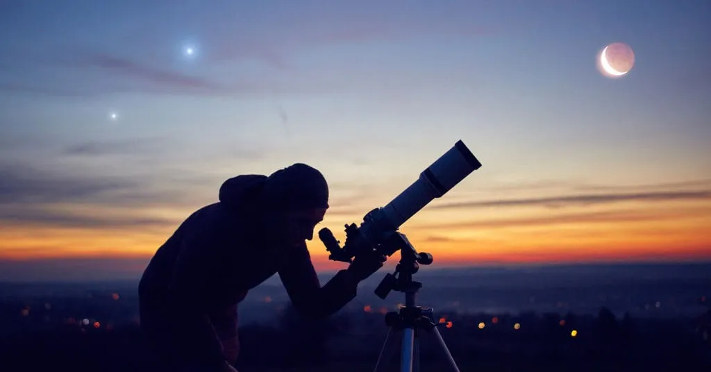 A man looking towards planet with a telescope Can Telescope See Planets