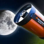 A person using a Celestron NexStar telescope to observe the moon. Telescopes use magnification to make distant objects appear larger and more detailed