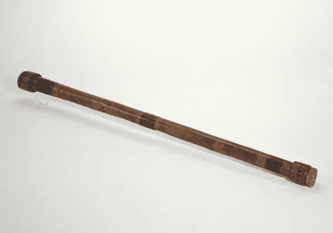 Historical illustration or depiction of Galileo Galilei's first telescope, a revolutionary optical instrument used for astronomical observations in the early 17th century.