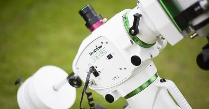 Sky-Watcher EQ6-R Pro, a heavy-duty computerized equatorial mount ideal for astrophotography. Features include belt-driven motors for smooth tracking, a 44-pound payload capacity, autoguider port, and PC control capabilities.